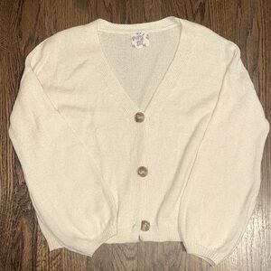 Cream button up sweater. Great for spring!